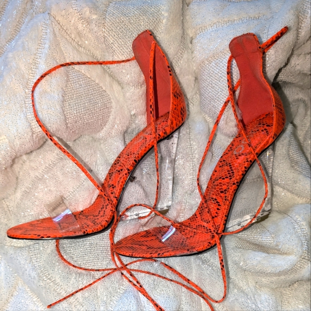 Ego size 8 snake print wedges